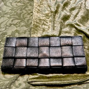 Michael Kors Metallic silver clutch 10x 5 1/2”